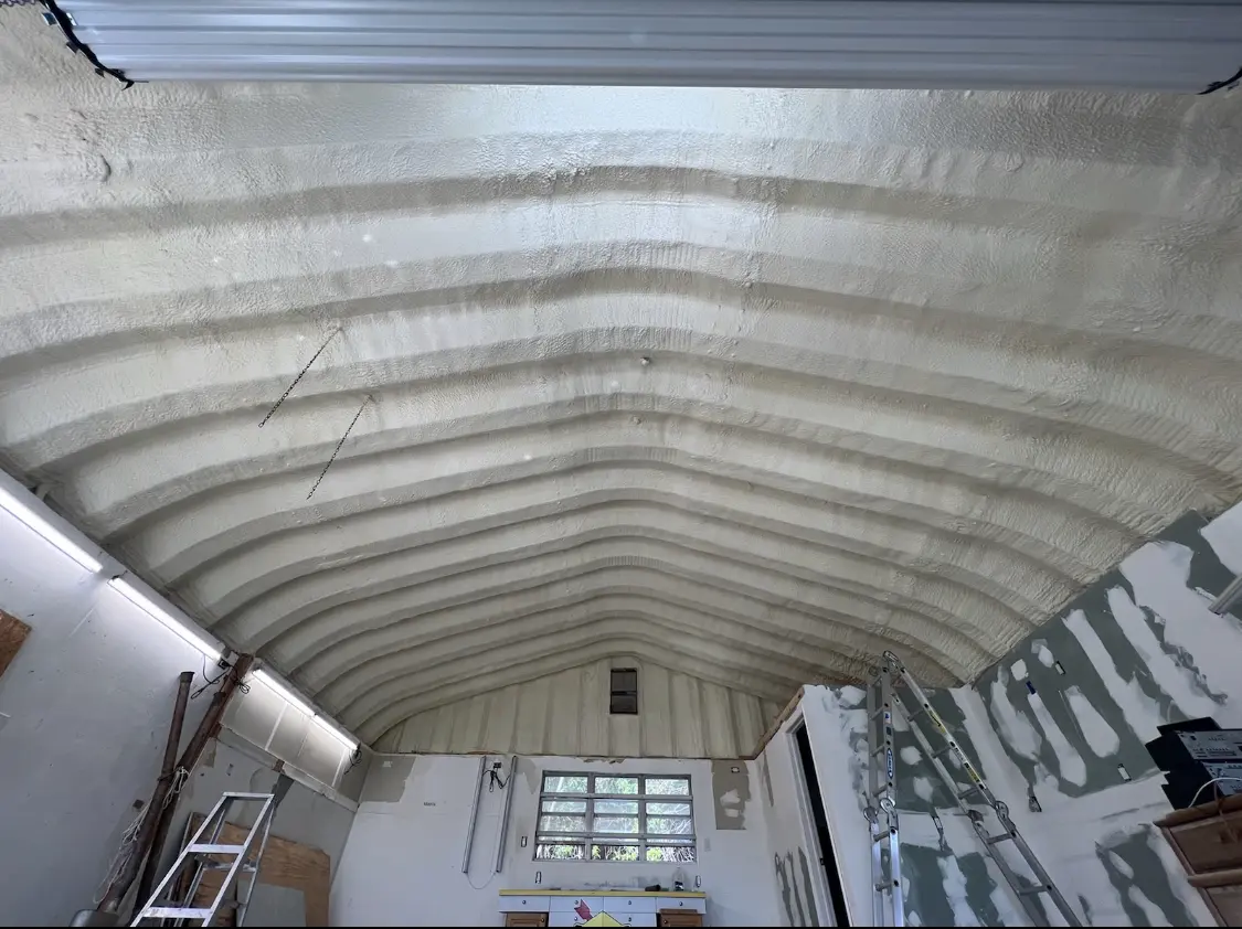 Spray polyurethane foam applied to the underside of a metal roof deck in Bithlo